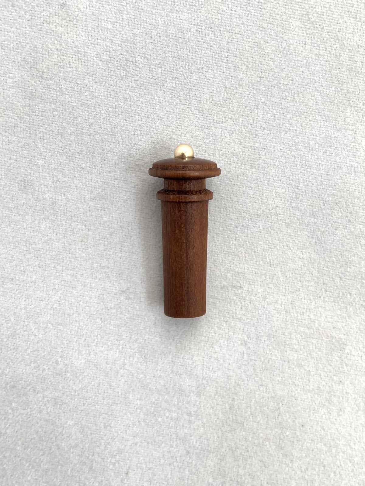 Endknopf-mit-kante-boxwood-gold Endknopf